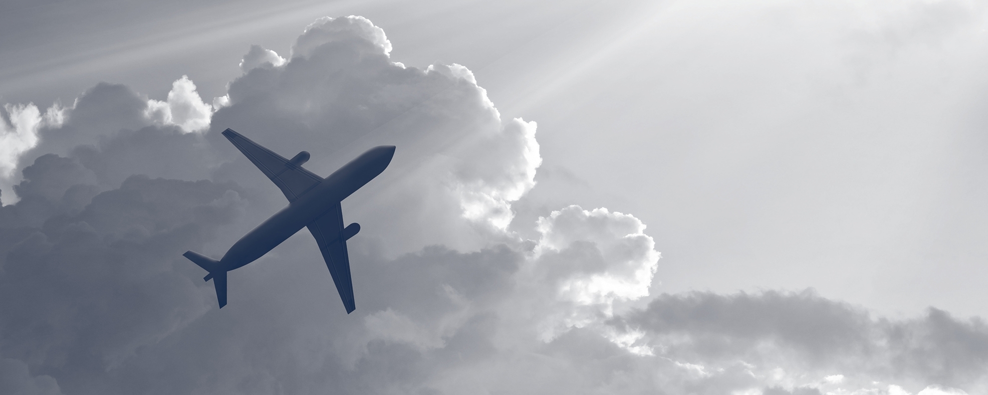 Airplane in the Sky with Clouds